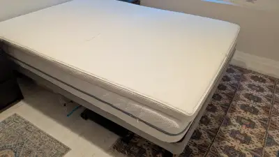Queen-size IKEA mattress and mattress topper for sale. Both are white in colour and in very good con...