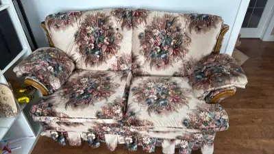 Old floral couch in good shape.
