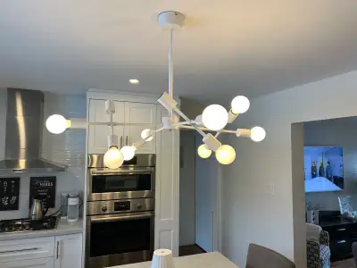 A contemporary, mid-century chandelier, View more