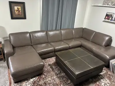 Genuine Italian top grain leather. 146” wide, left chaise is 73” deep, right chaise is 84” deep. Goo...