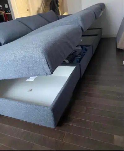 deliver almost new couch with storage , View more