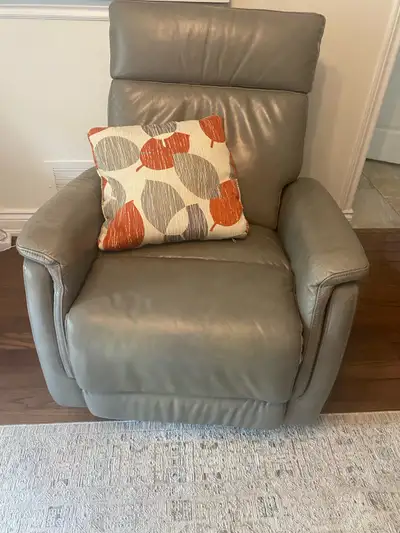 Grey leather recliner, View more