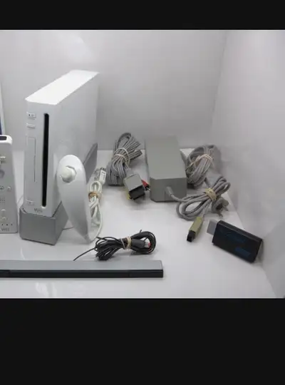 Modded Nintendo Wii for sale Comes with the fallowing Wii white. 2 remotes No nun Chuck 1 wired Wii...