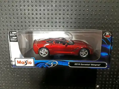 Up for sale is a die-cast model of a 2014 Corvette Stingray. Made of die cast metal in 1:18 scale. R...