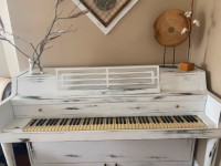 White wooden piano
