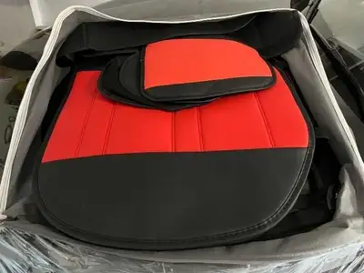 These are used BMW 3 Series car seat covers, featuring a stylish red and black design to enhance you...