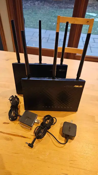 Two used, but working perfectly Asus RT68U Mesh WiFi Routers. Described by fans as Prosumer (more ad...