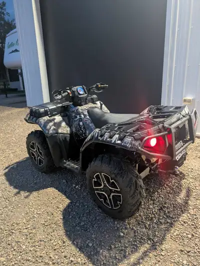 2016 Polaris sportsman 850 has front and rear bumpers hand guards front storage box warn winch loone...