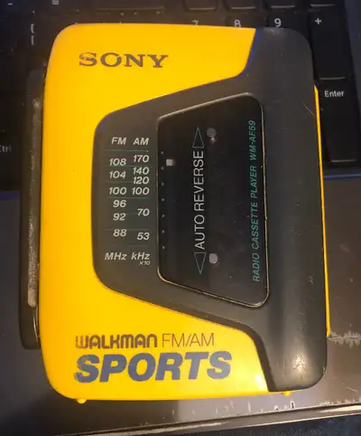 Sony WM-AF59 Works great. Battery cover is there, but the prong on one side is missing. It stays in...