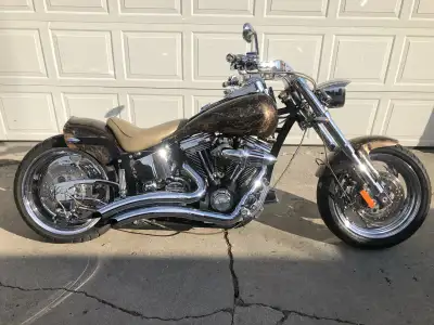 Custom motorcycle has 96 cubic inch S&S engine, Vance &Hines pipes and mileage is 5469 km .