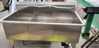 New 3 compartment sink for sale. Canadian made by KM Sheet Metal in Winnipeg. 52" outside diameter....