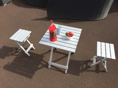 This folding table and two small stools set is perfect for small spaces, camping, or extra seating i...