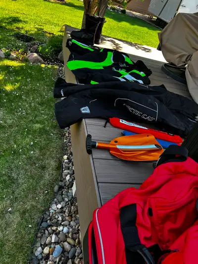Size XL, 2 layer arctic cat suit & pants, includes wheeled bag, FXR boots, 2 sets of gloves, avalanc...