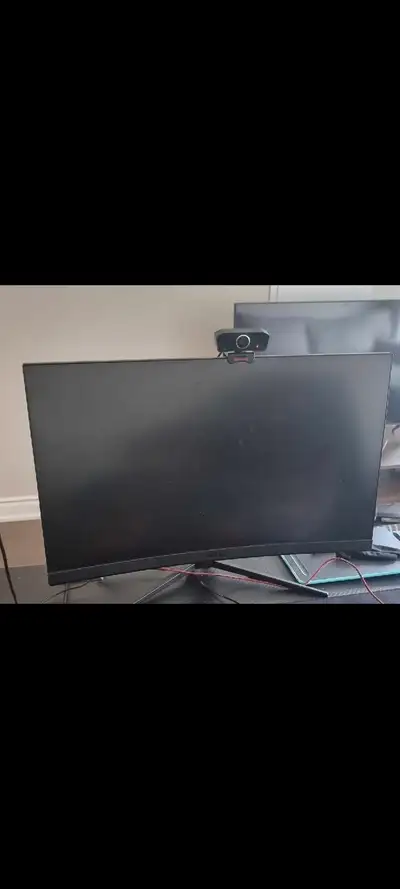 MSI, 27 inch curved gaming monitor.It includes HDMI and VGA input.The information is in the pictures...