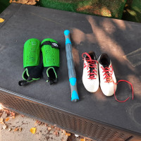 Kids soccer cleats, youth shin guards, roller massager
