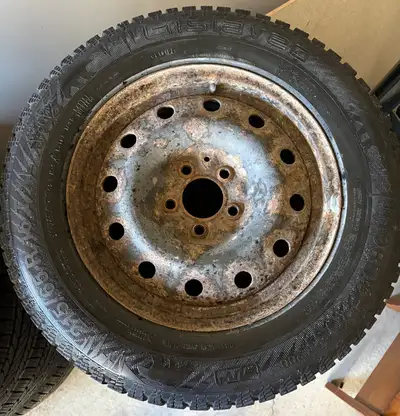 These are a set of used winter tires, size 215/65R16, ready to tackle snowy roads. The tires have a...