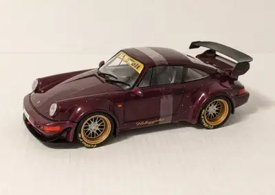 Solido 1/18th scale 2012 Porsche 911 964 RWB Hekigyoku in purple. Model comes in a box - makes a ver...