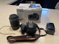 Canon EOS Rebel SL2 + 18-135MM lens + Battery + Strap + Charger