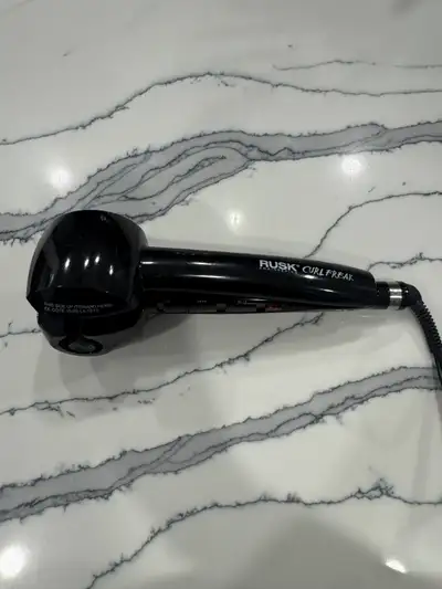 This Rusk Professional Automatic Hair Curler has hardly been used and makes curling your hair a bree...