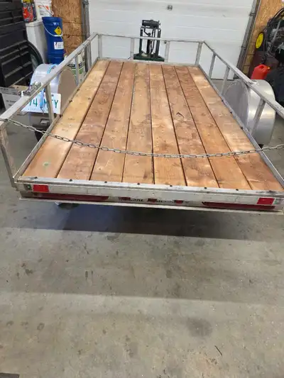 2010 5x10 Aluminum Utility Trailer 3500 lb axle Newly rebuilt deck with pressure-treated lumber Elec...