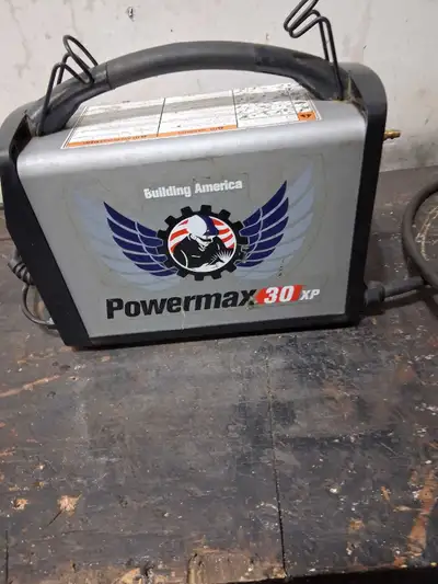 Plasma cutter new is worth 2200.00 selling no longer need works well comes with 15 foot torch and 15...