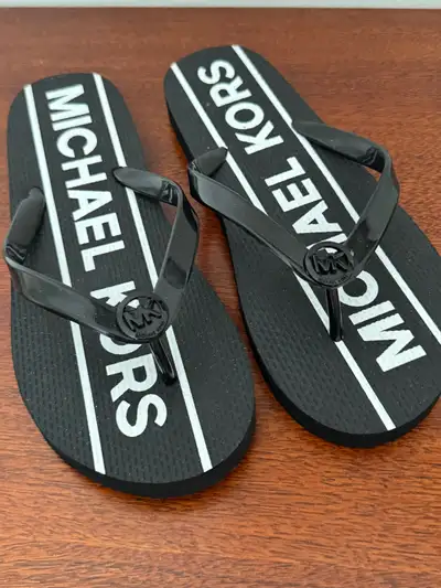 Michael Kors flip flop new., View more