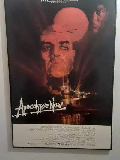 Own a piece of cinematic history with this framed Apocalypse Now movie poster! This vintage poster i...