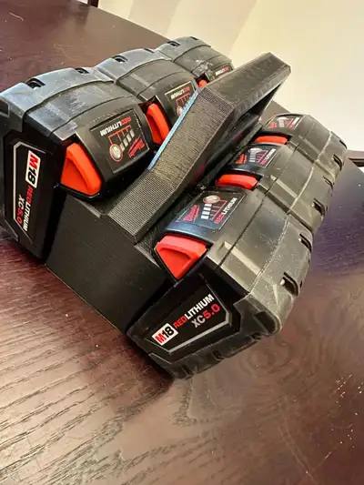 a convenient caddy that holds 6 large M18 batteries no problem….