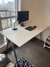 Large white desk with IKEA Thyge metal adjustable leg frame