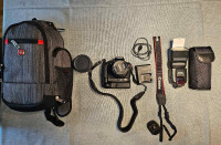 Canon Rebel T5 with Sigma 17-70mm lens, Battery Grip, Speedlight