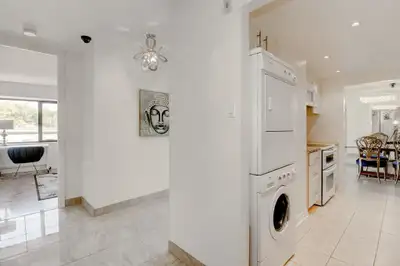 The Apartment: -Located on the 9th floor, offering abundant natural light and city views -Large wind...