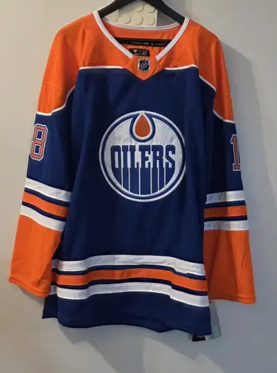 Large Variety of Oilers Blue Home Jerseys!!, View more