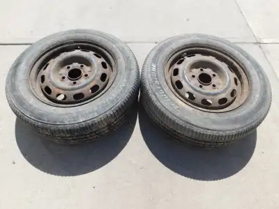 2 Bridgestone all season tires with steel rims are for sale. Tires are 205/65/15. Rims are 5 holes,...