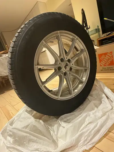 I'm selling a set of used 18 inch Hankook Winter i*Pike tires mounted on stylish aluminum rims, size...