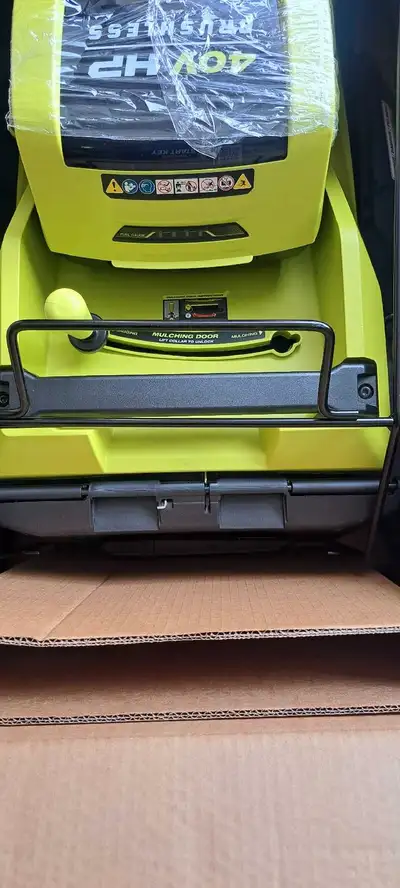 Brand new 21 inch Ryobi lawnmower still in box never used. Please look at pics to see the details of...