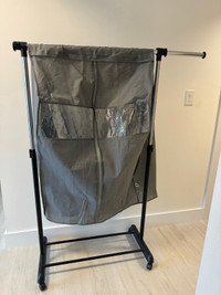 Rolling clothing rack 
