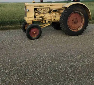 Looking for used tractor tires for this Minneapolis moline U special, Looking for the back tires, 14...