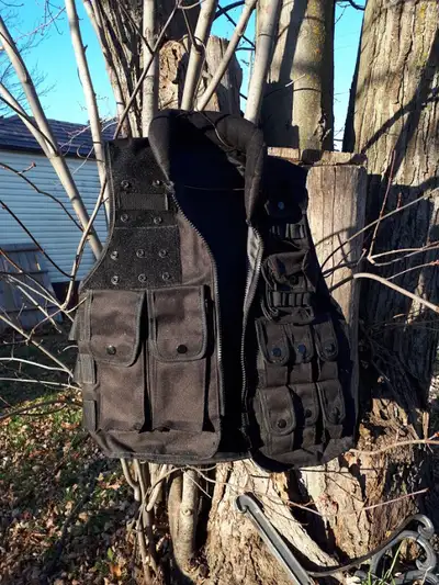 Selling a tactical vest in new condition. Would also be good for fishing, photography, hiking, etc....