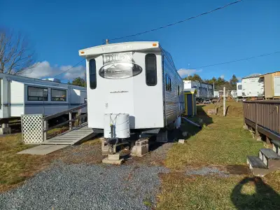 For sale 2014 dlx 40ft wildwood with 3 sides at little lake campround out side lunenburg. Lot 61 Lot...