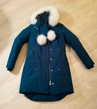3/4 length Moose Knuckles down filled winter jacket for women in XS. Jacket had a double zipper, fro...