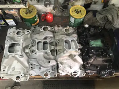 SBC intake manifolds. Square bore and spread bore. Your choice for $80 each. Phone 780-719-6883