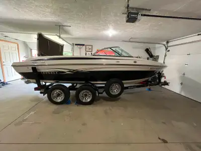 2013 Reinell 197LS with Volvo 4.3Gl, 200h.p. Boat comes with Sport seating dual flip up booster seat...