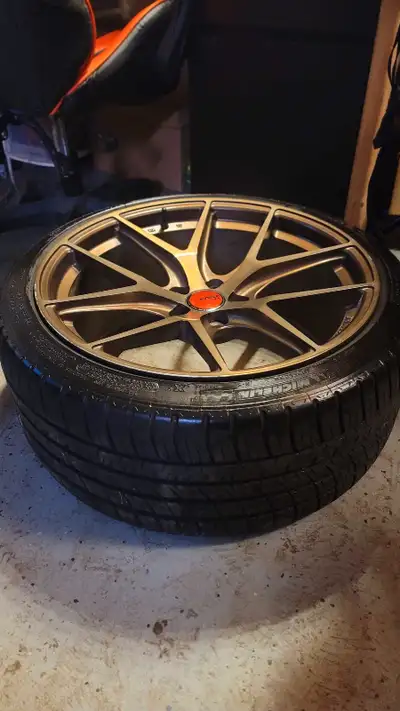 Set of 4 rims with 2 almost new Ironman imove gen 2 performance A/S tires. Flow formed wheels which...