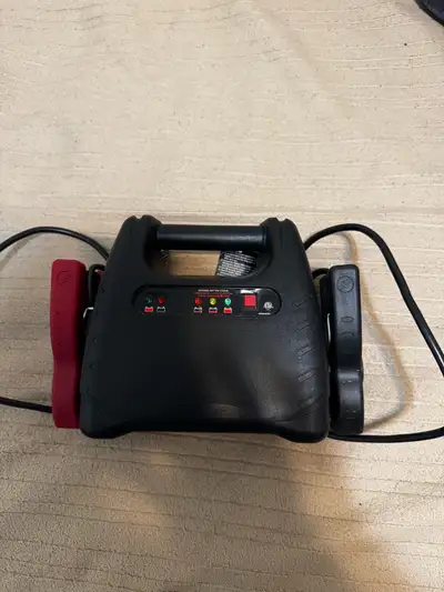 This portable jump starter is a reliable tool for quickly starting your vehicle in emergency situati...