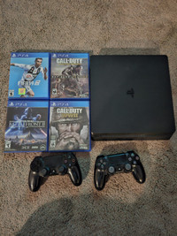 PS4 SLIM 1TB WITH 2 CONTROLLERS AND 4 GAMES