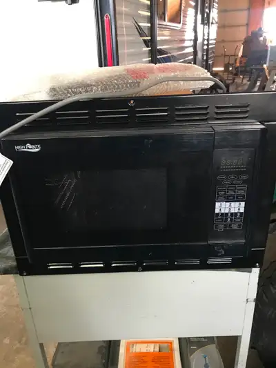 Microwave barely used. Perfect condition 70$ Also, two Jayco octane folding couch/beds in excellent...