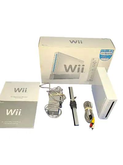 Nintendo wii with all cables and the original box, View more
