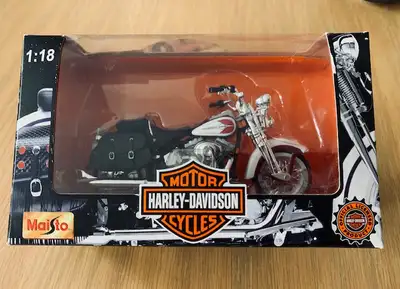 Maisto model is series 11, 2001 FLSTS Heritage Springer. It is 1:18 scale, in original box and in ex...