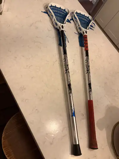 two warrior lacrosse sticks, View more