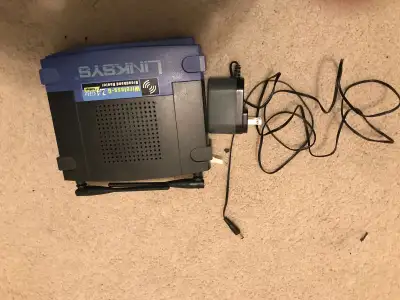 linksys wireless-g broadband router with 4 port switch. Like new condition. Asking 45 obo